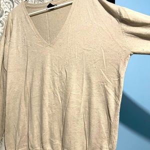 Sweater has been worn. Nice cozy fall/winter sweater